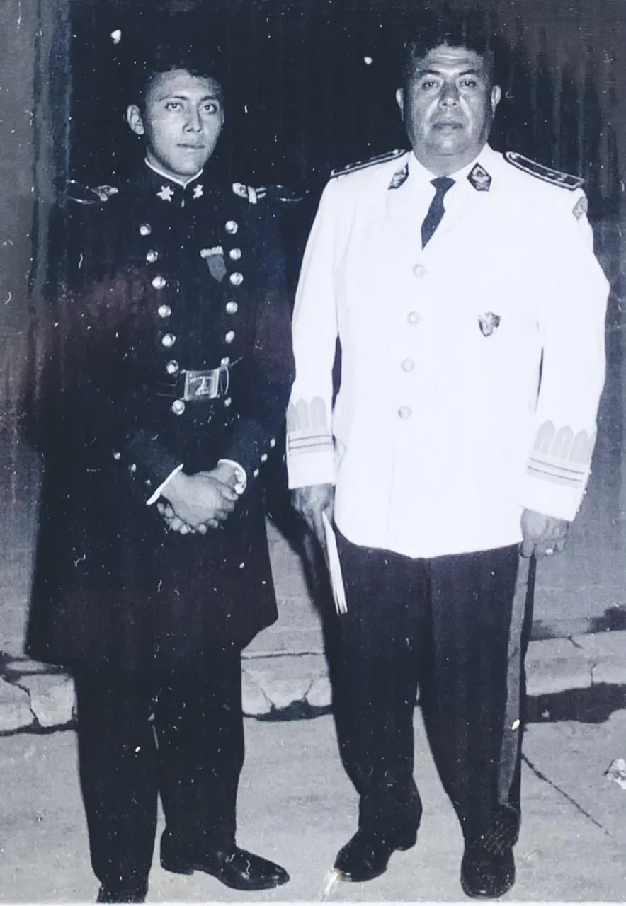 Black and white photograph: a young Captain Zepeda in dress uniform, beside his father, General Arturo Zepeda